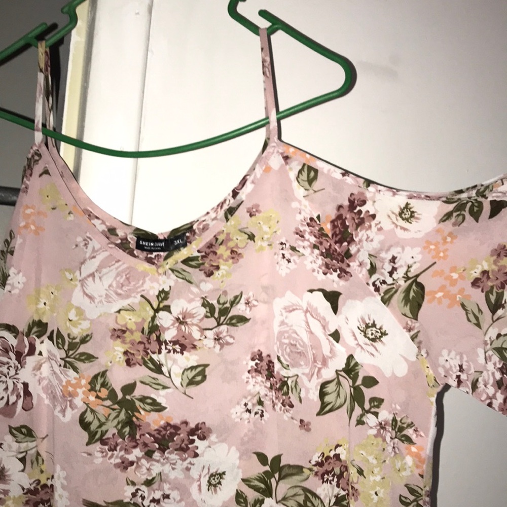 Pink flowery blouse really nice if you want your shoulders out comfortable